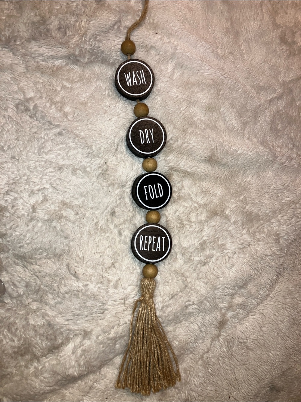 Neutral Brown 'Wash Dry Fold Repeat' Hanging Wall Decor